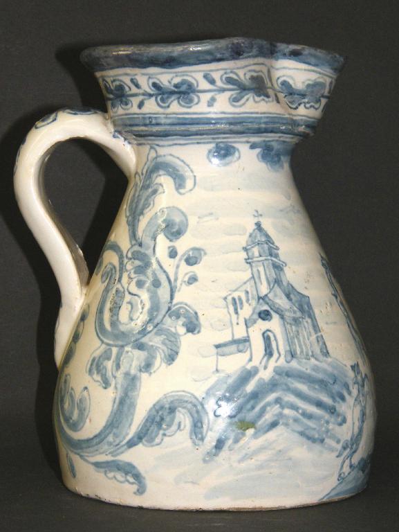 Appraisal: Delft blue and white painted jug decorated with a hunter