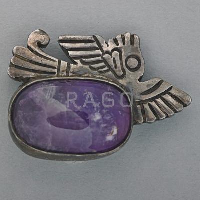 Appraisal: WILLIAM SPRATLING SILVER AMETHYST EAGLE PIN Chiseled Glyptic eagle and