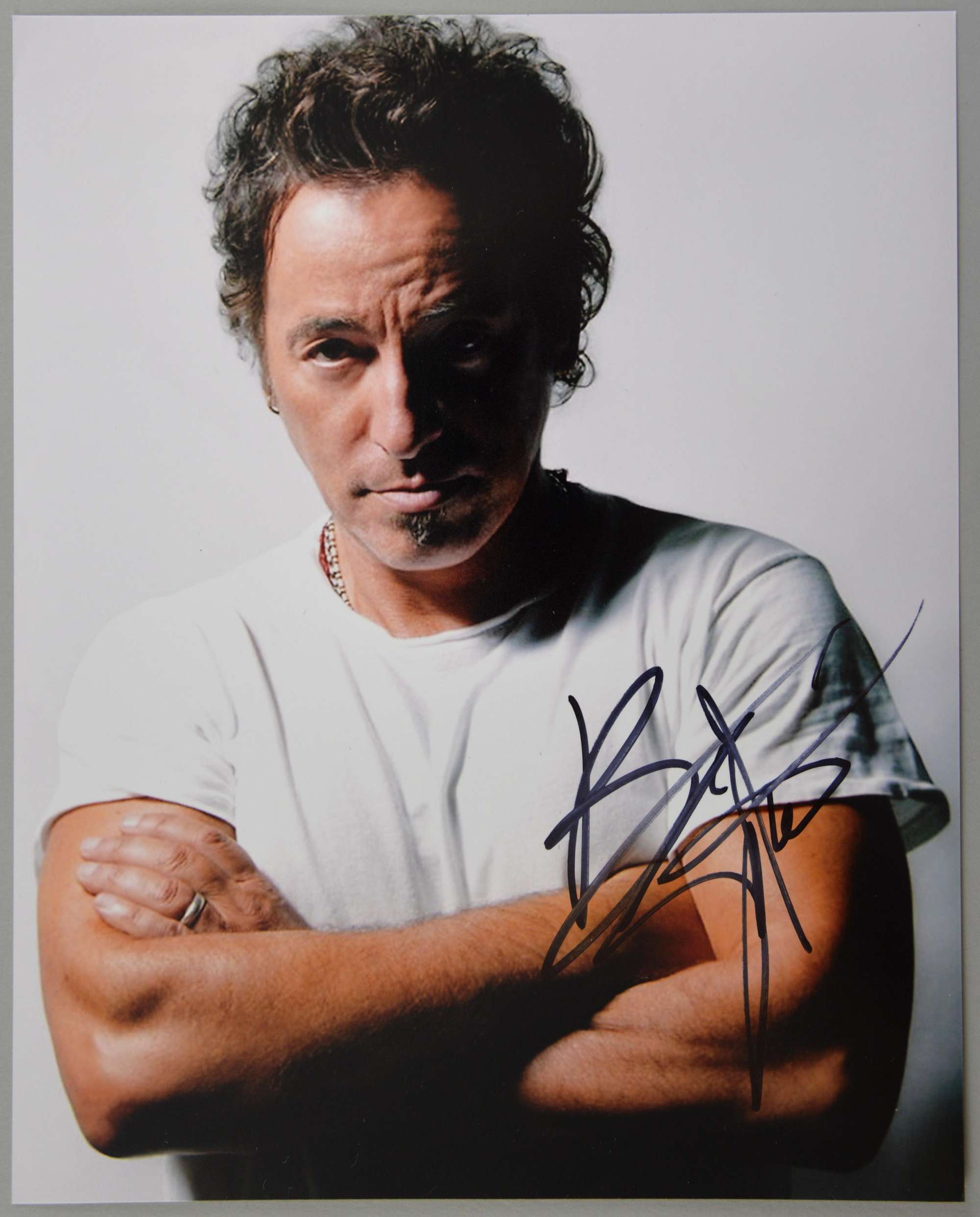 Appraisal: Bruce Springsteen signed colour photograph x inches