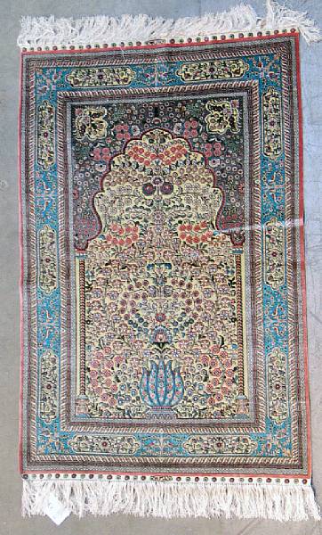 Appraisal: A Turkish silk and metal thread rug size approximately ft