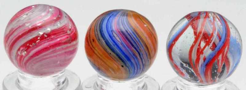 Appraisal: Lot of Handmade Marbles Includes one four-paneled left handed twist