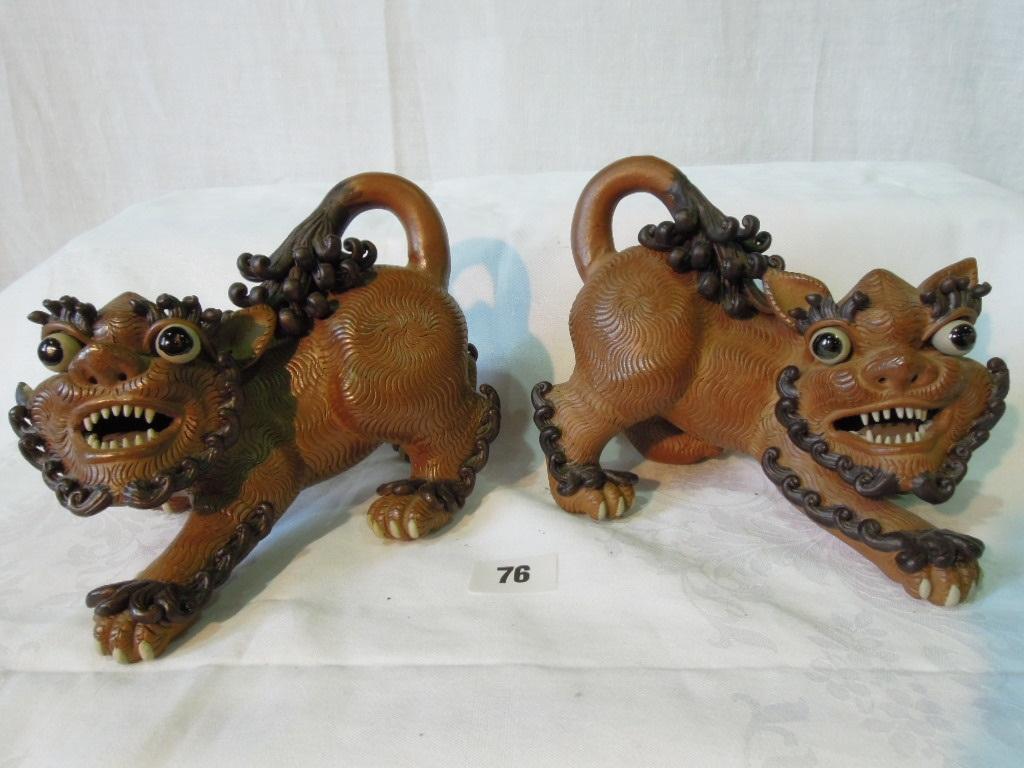 Appraisal: A pair of th century oriental brown glazed heavy pottery