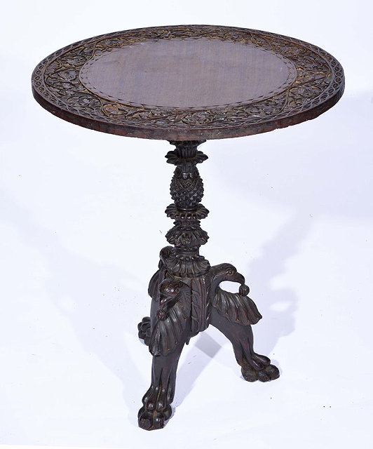 Appraisal: A TH CENTURY CARVED BURMESE HARDWOOD CIRCULAR OCCASIONAL TABLE with