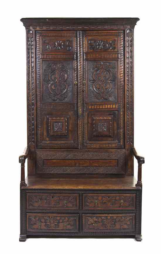 Appraisal: A Renaissance Revival Carved Oak Bacon Settle th th century