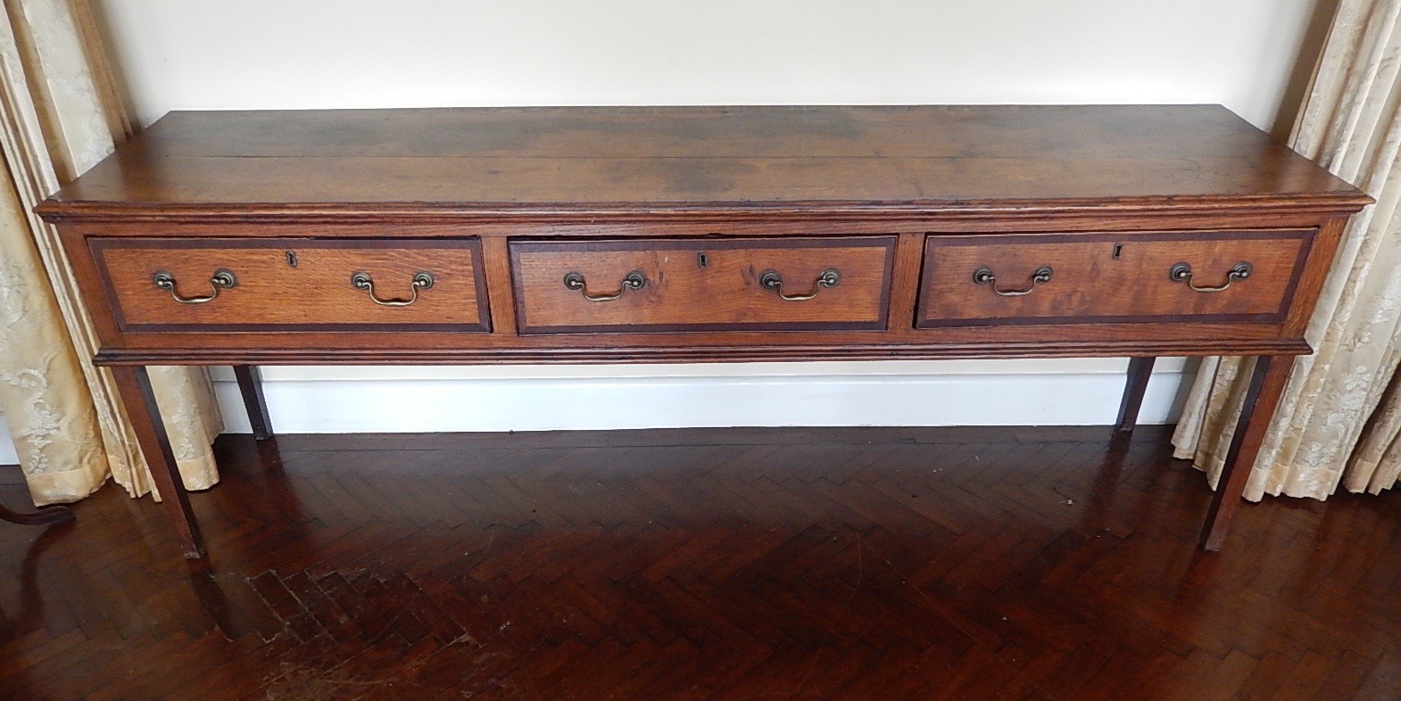 Appraisal: A George III oak dresser base with moulded border to