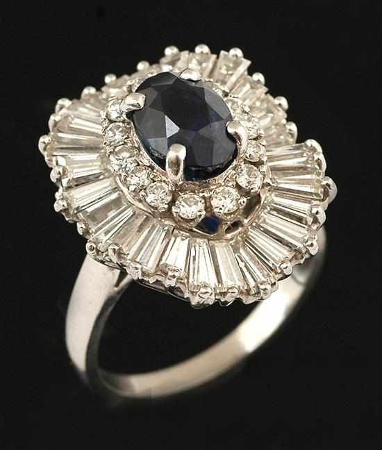 Appraisal: A sapphire and diamond cluster ring pendant Of ballerina cluster