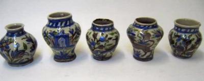 Appraisal: A MATCHED PAIR OF QUJAR SMALL VASES th century of