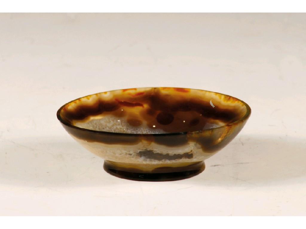 Appraisal: A CHINESE CARVED AGATE OVAL DISH with a shallow bowl