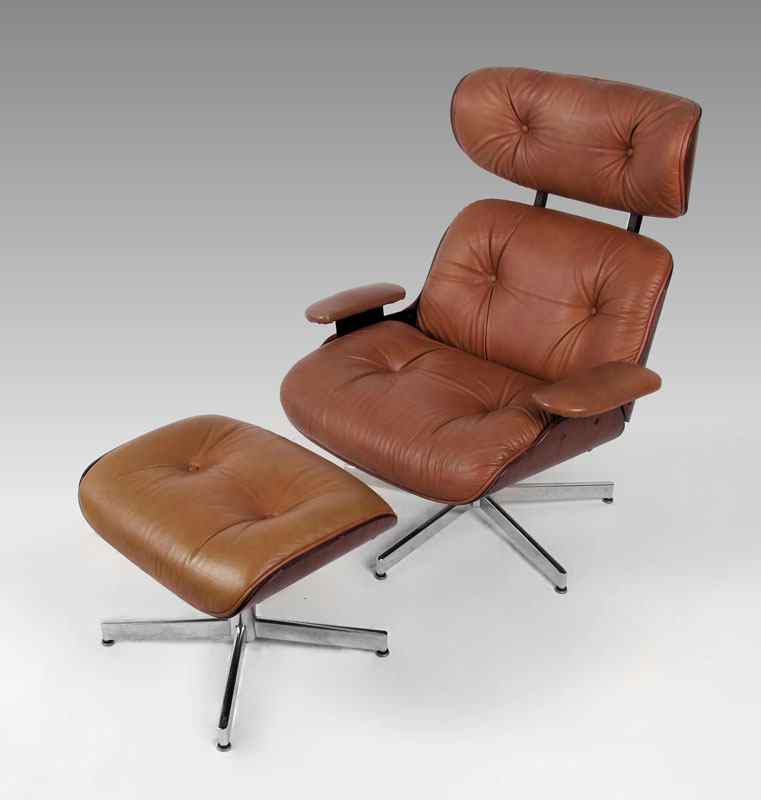 Appraisal: EAMES STYLE LOUNGE CHAIR WITH OTTOMAN Tan leather in the