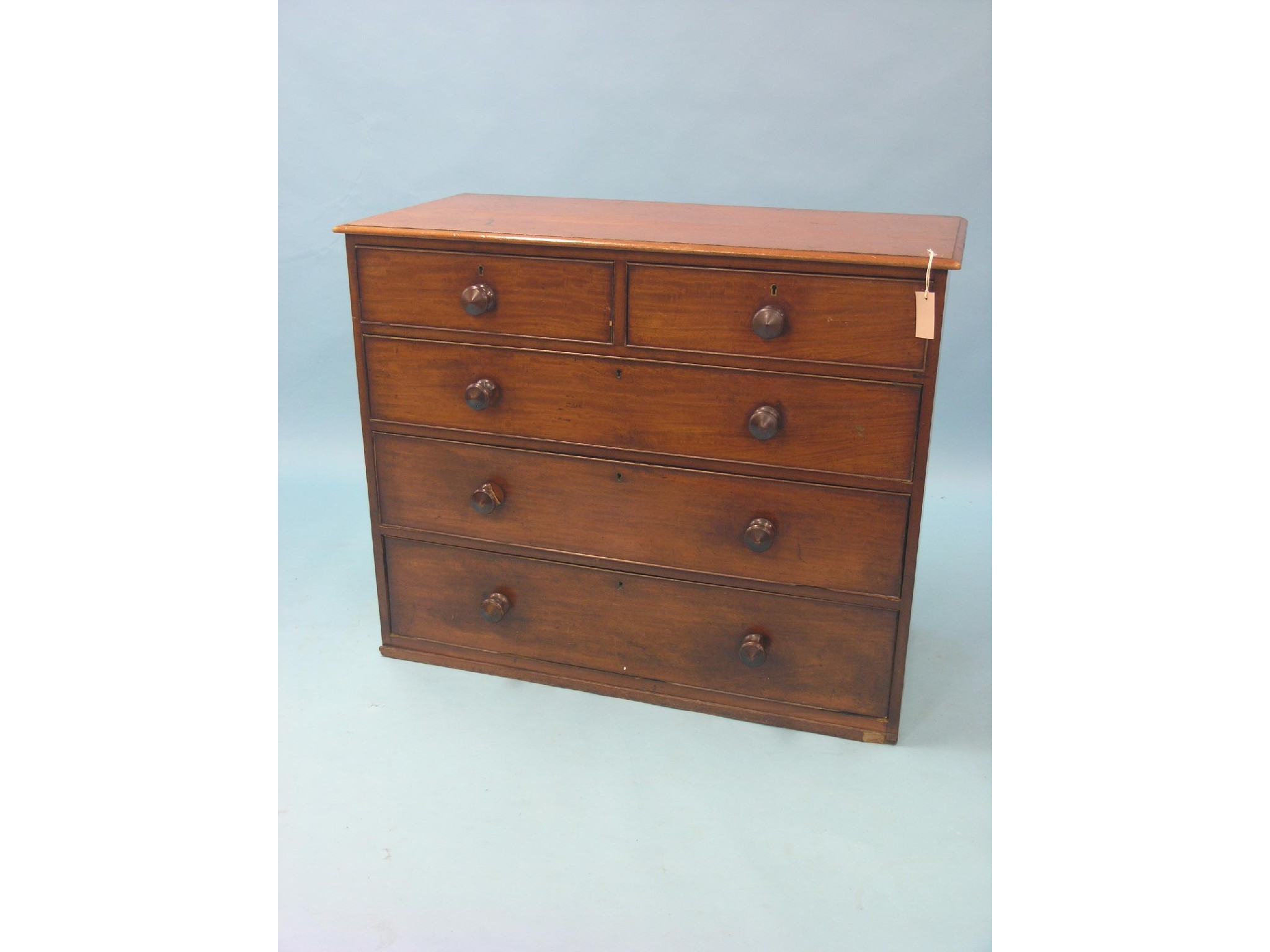 Appraisal: A Victorian mahogany chest two short and three long oak-lined