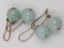 Appraisal: Two pairs of jade bead earrings mounted with yellow metal