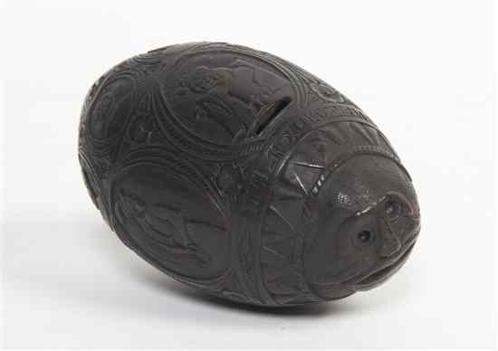 Appraisal: A Mexican Carved Coconut Bank of ovoid form decorated with