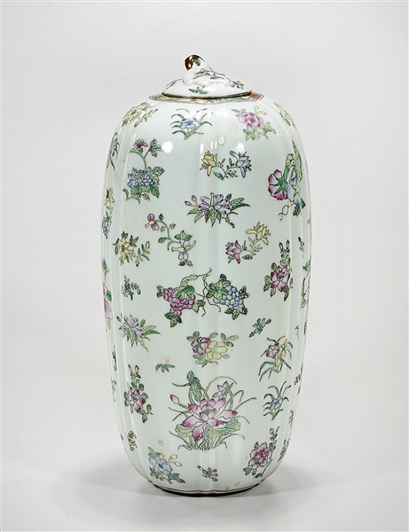 Appraisal: Chinese enameled porcelain covered vase with flower and insect decoration