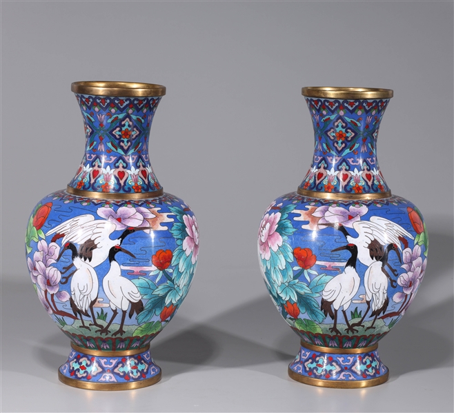 Appraisal: Pair of Chinese blue ground cloisonn enameled vases with bird