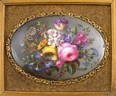 Appraisal: A porcelain oval plaque painted with a still life of