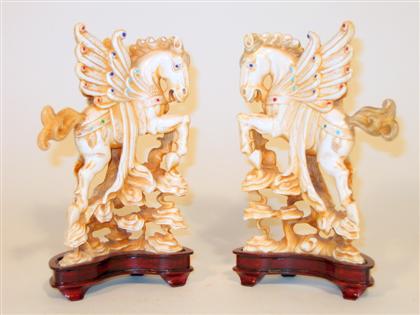 Appraisal: Pair of Chinese elephant ivory and jeweled models Carved to