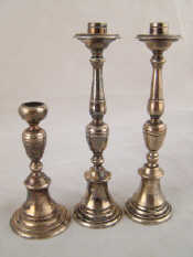 Appraisal: A pair of silver plated tapersticks together with an incomplete