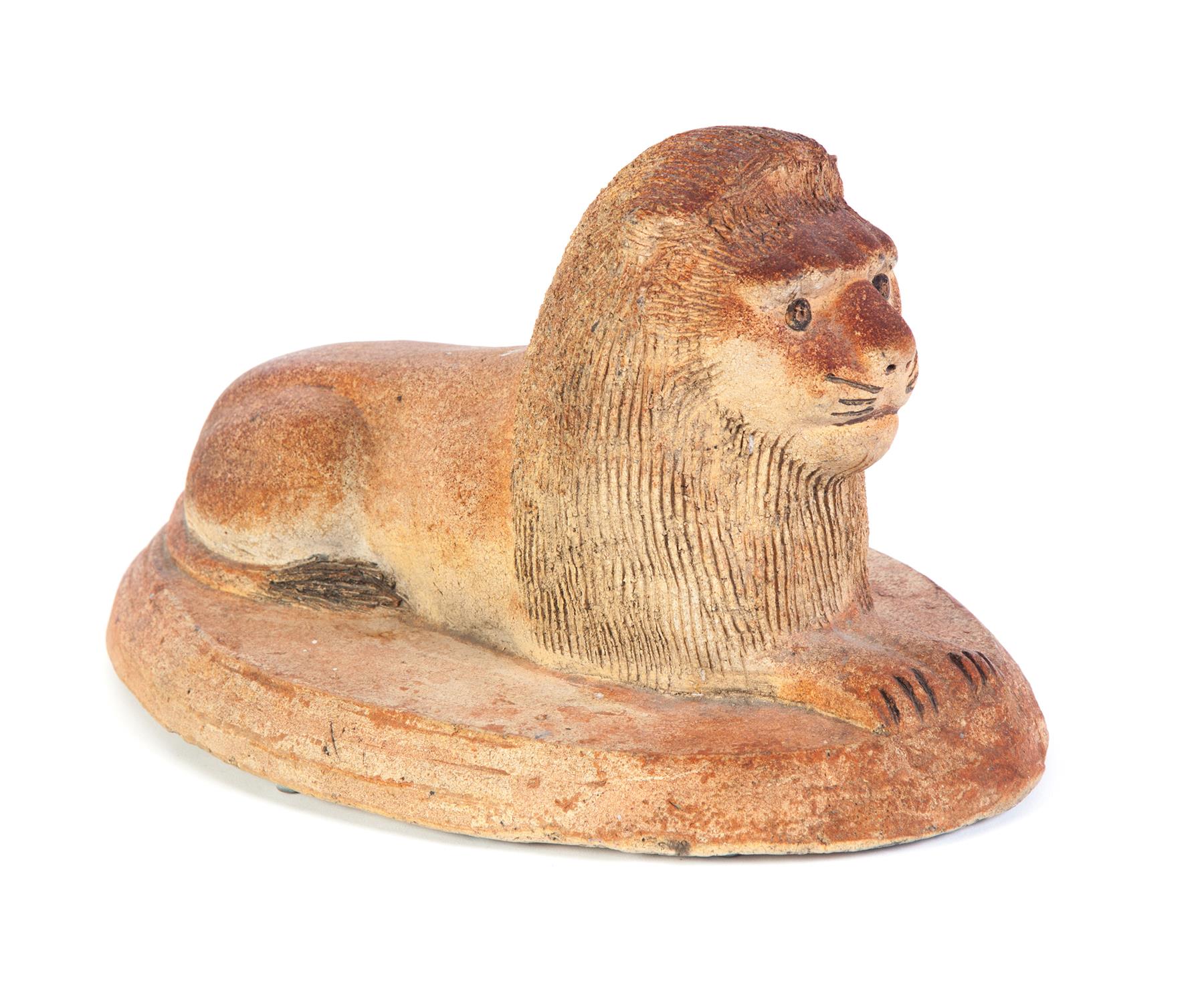 Appraisal: OHIO SEWERTILE LION Late th-early th century Reclining lion in