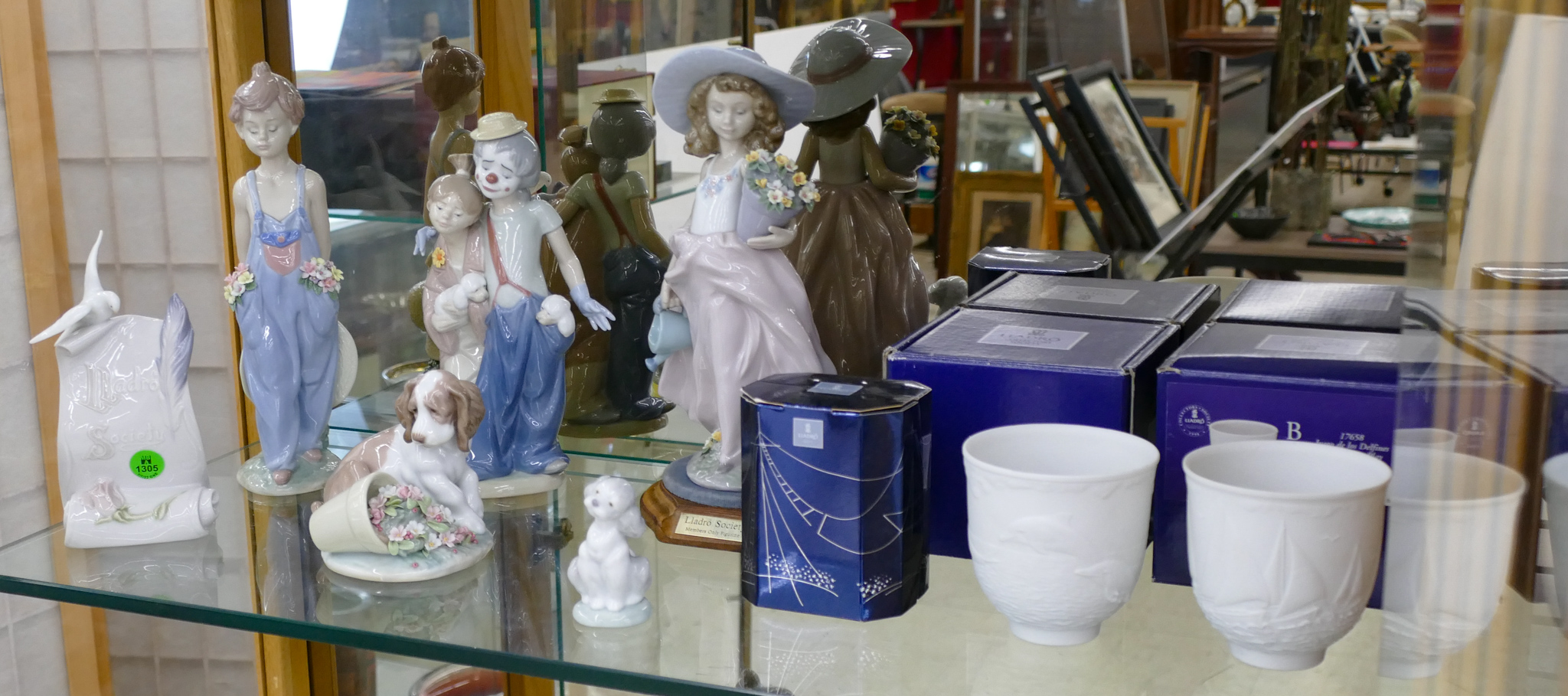 Appraisal: pc Lladro Collector's Society Porcelain Figurines and Cups with Boxes