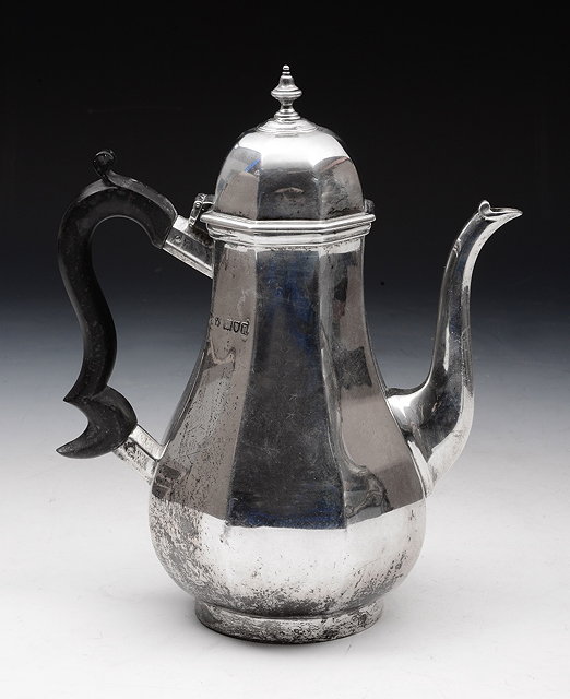 Appraisal: AN OCTAGONAL AND BALUSTER SHAPED SILVER COFFEE POT with matching