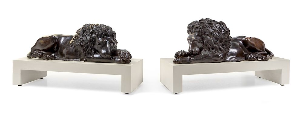 Appraisal: A Pair of Continental Bronze Models of Recumbent Lions A