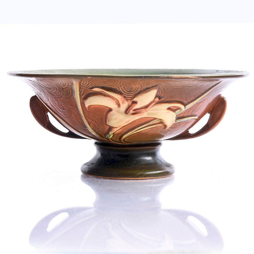 Appraisal: ROSEVILLE POTTERY ZEPHYR LILY FOOTED BOWL Double handled honey colored