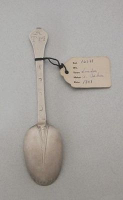 Appraisal: A William III wavy-end dessert spoon with a bead and