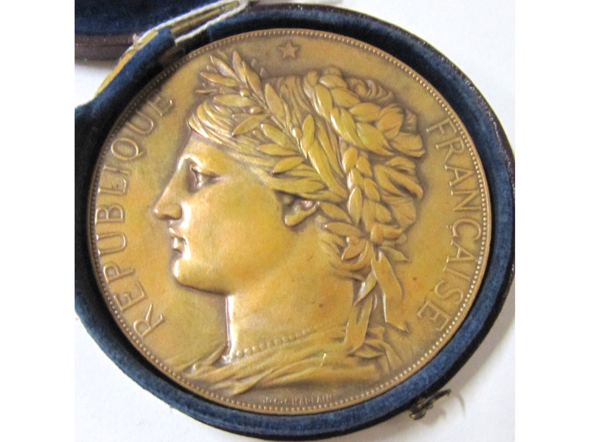 Appraisal: A cased medallion - International Exposition Paris