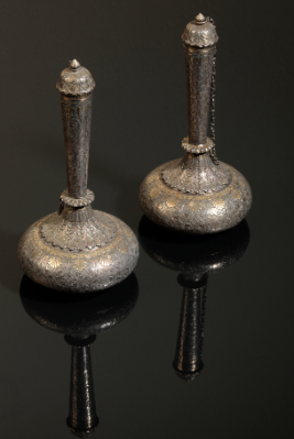 Appraisal: A PAIR OF INDIAN SILVER AND PARCEL-GILT 'SUHARE' WINE FLASKS