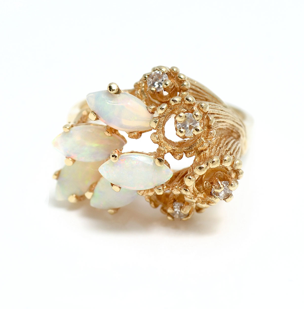 Appraisal: K OPAL DIAMOND RING K yellow gold ring contains round