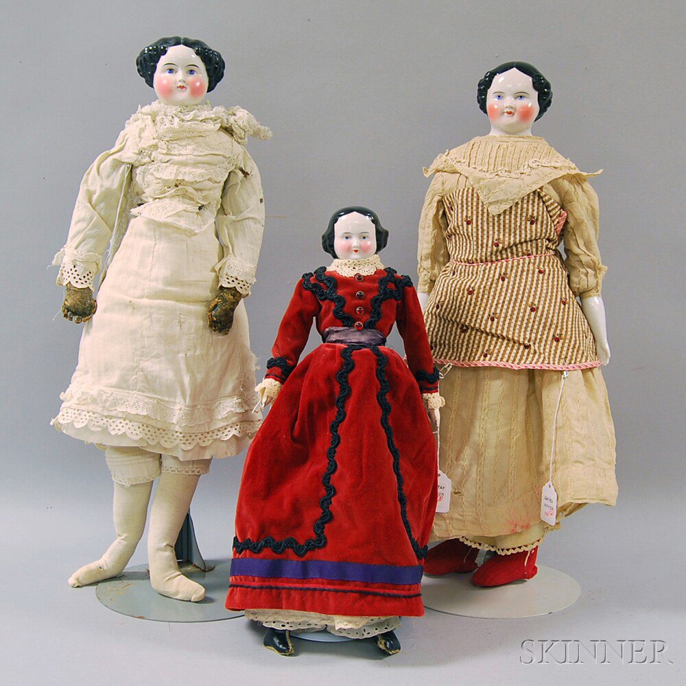 Appraisal: Three German China Head Dolls late th century all with