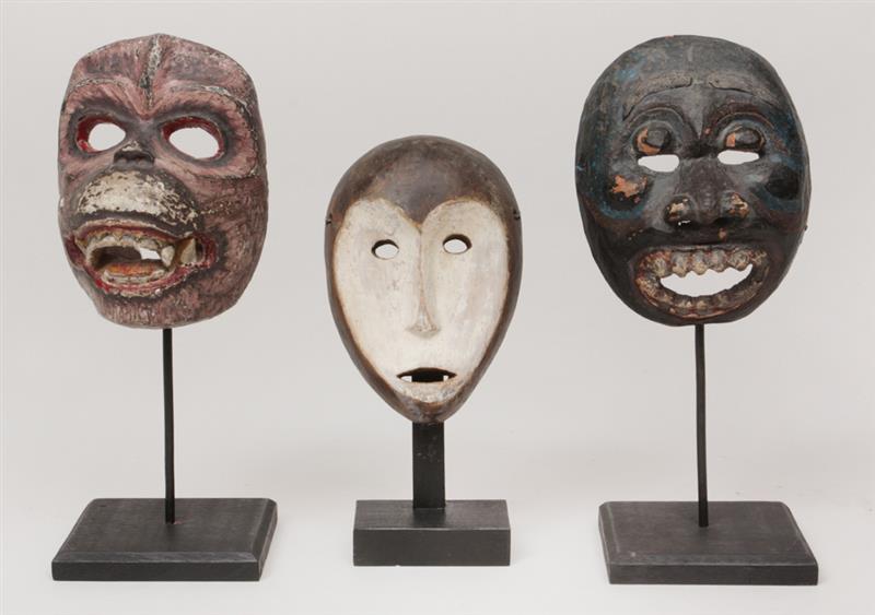 Appraisal: Three African Carved and Painted Wooden Animal-Form Masks Comprising an