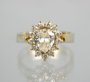 Appraisal: A Ladies' Diamond Ring Unmarked yellow gold mount ring set