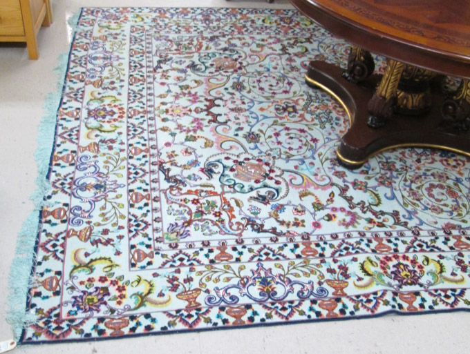 Appraisal: PERSIAN PILE AND METALLIC FLATWEAVE CARPET featuring a colorful floral