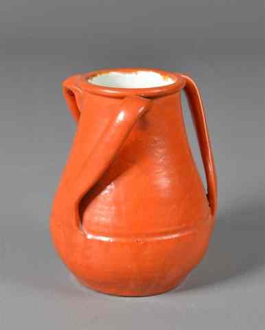 Appraisal: Stangl Pottery jugWith three shaped handles and burnt orage glaze