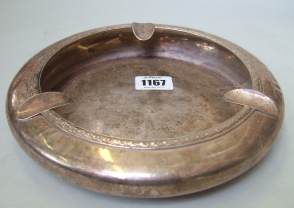 Appraisal: A silver circular cigar ashtray by Tiffany Co with a