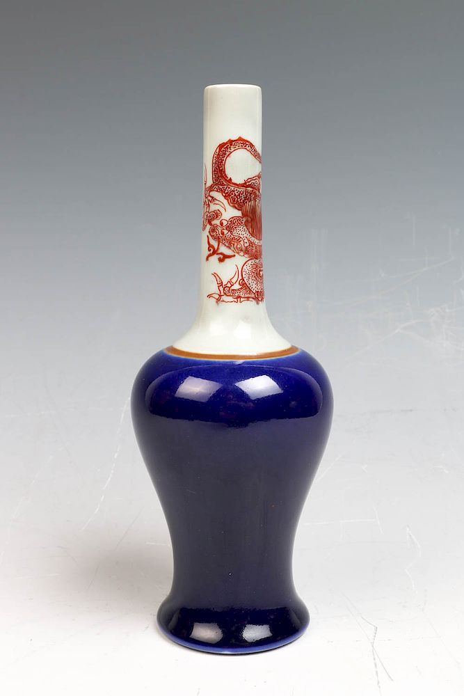 Appraisal: UNUSUAL BLUE WHITE AND COPPER RED BOTTLE VASE KANGXI MARK