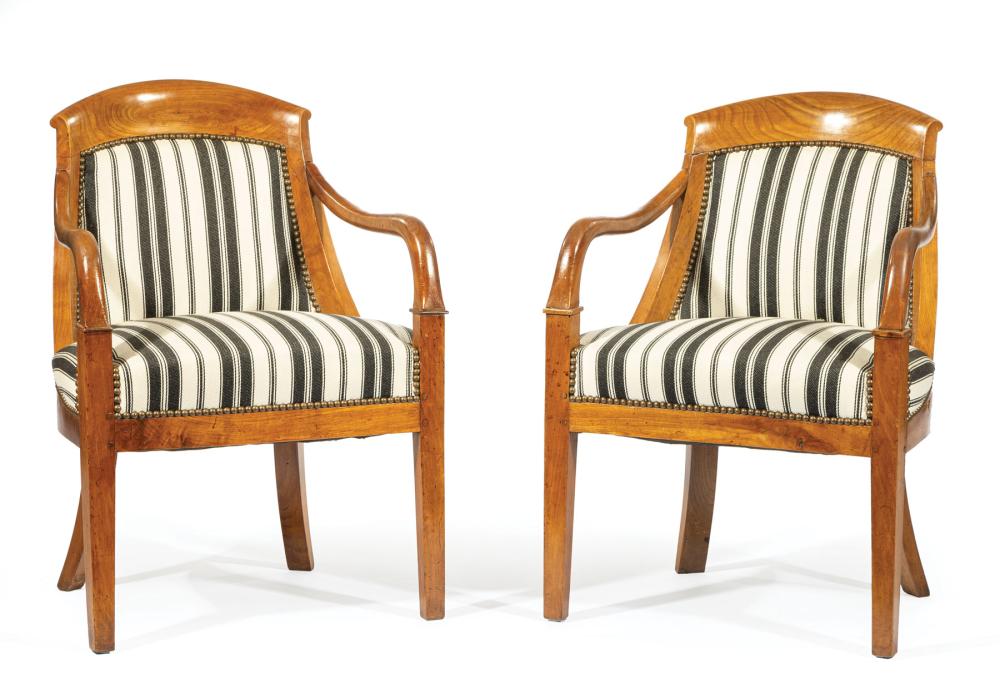 Appraisal: Pair of Directoire Fruitwood Fauteuils th c shaped arched scrolled