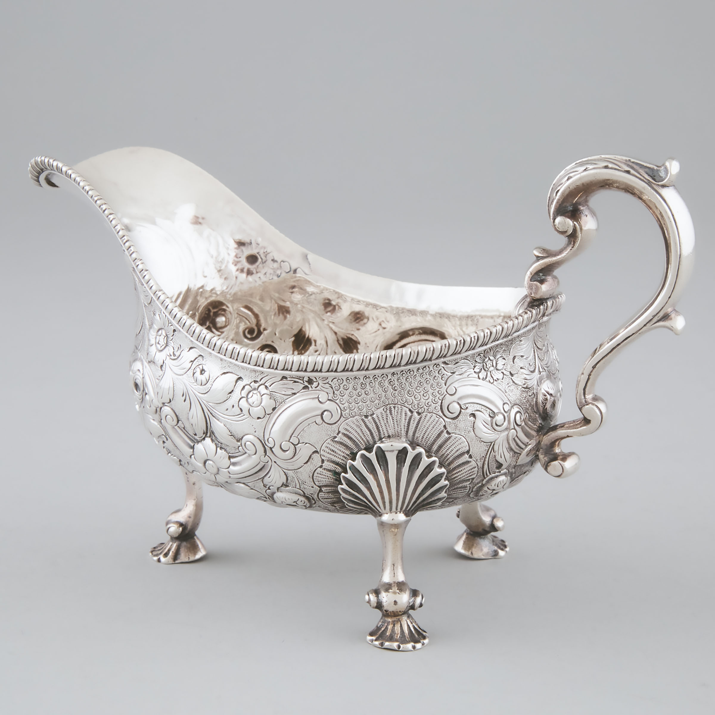 Appraisal: George IV Silver Sauce Boat probably John Wakefield London length