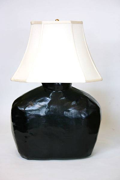 Appraisal: A pair of black lacquered shouldered lamps greatest height in