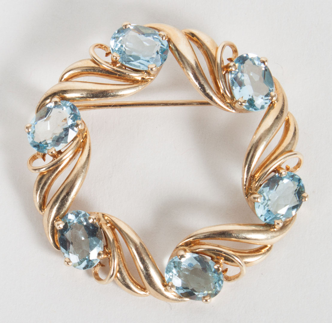 Appraisal: K gold and aquamarine circle pin in Diam grams