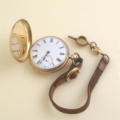 Appraisal: An ct gold hunting cased pocket watch White enamel dial