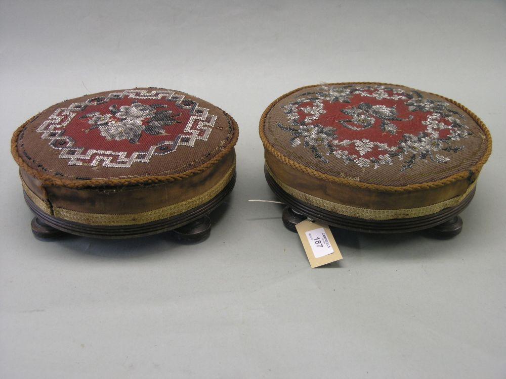 Appraisal: Two Victorian walnut framed beadwork footstools circular shape each on