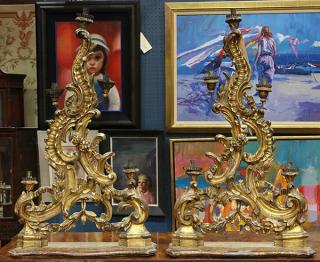 Appraisal: Pair of Italian Rococo style giltwood carved candelabra circa Pair