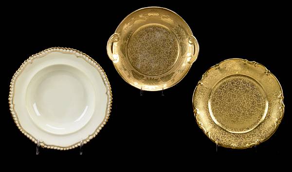 Appraisal: A set of four assorted gilt decorated plates together with