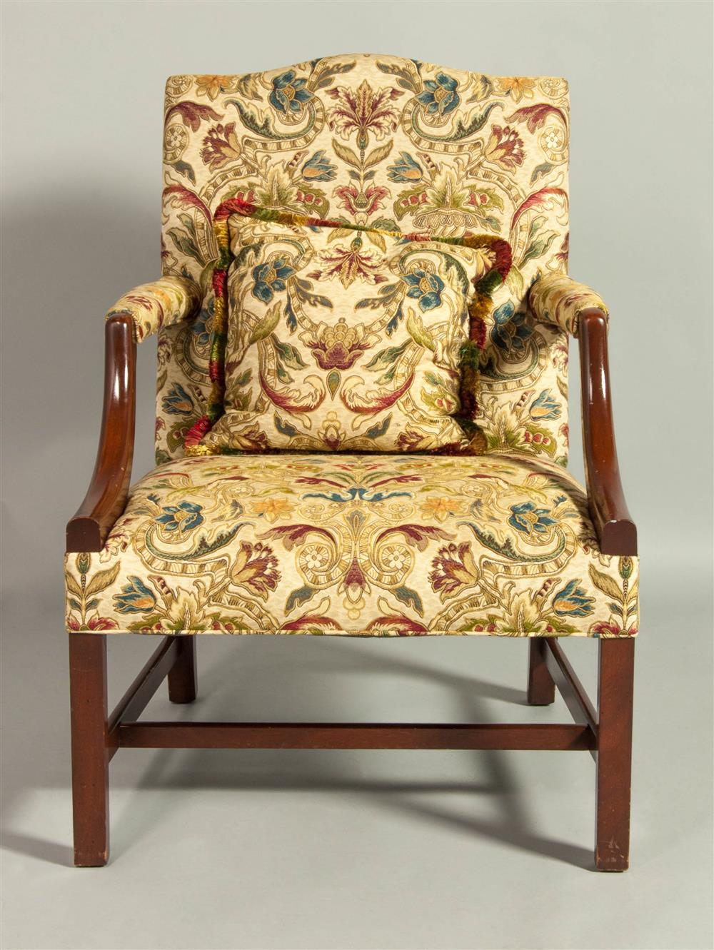 Appraisal: GEORGE III STYLE MAHOGANY LIBRARY ARM CHAIR shaped crest above