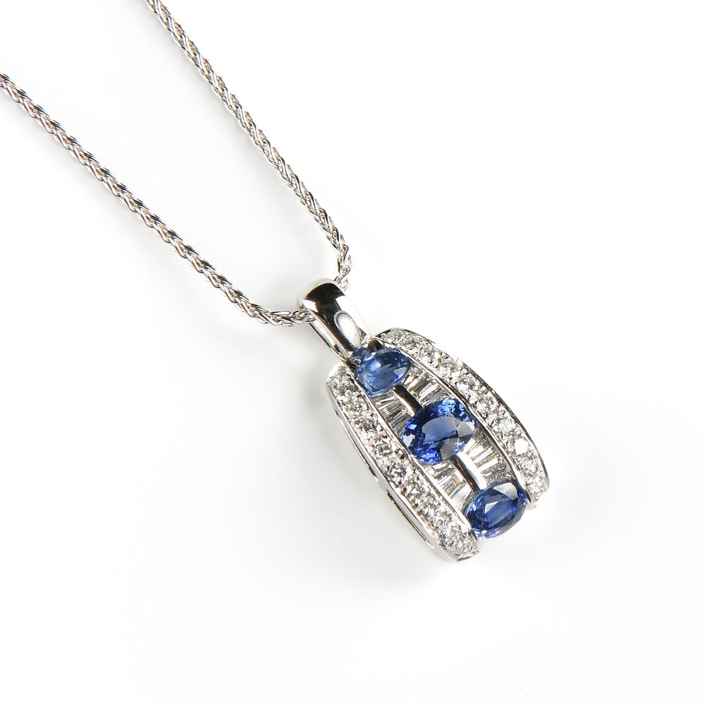 Appraisal: A DE HAGO STYLE K WHITE GOLD DIAMOND AND SAPPHIRE