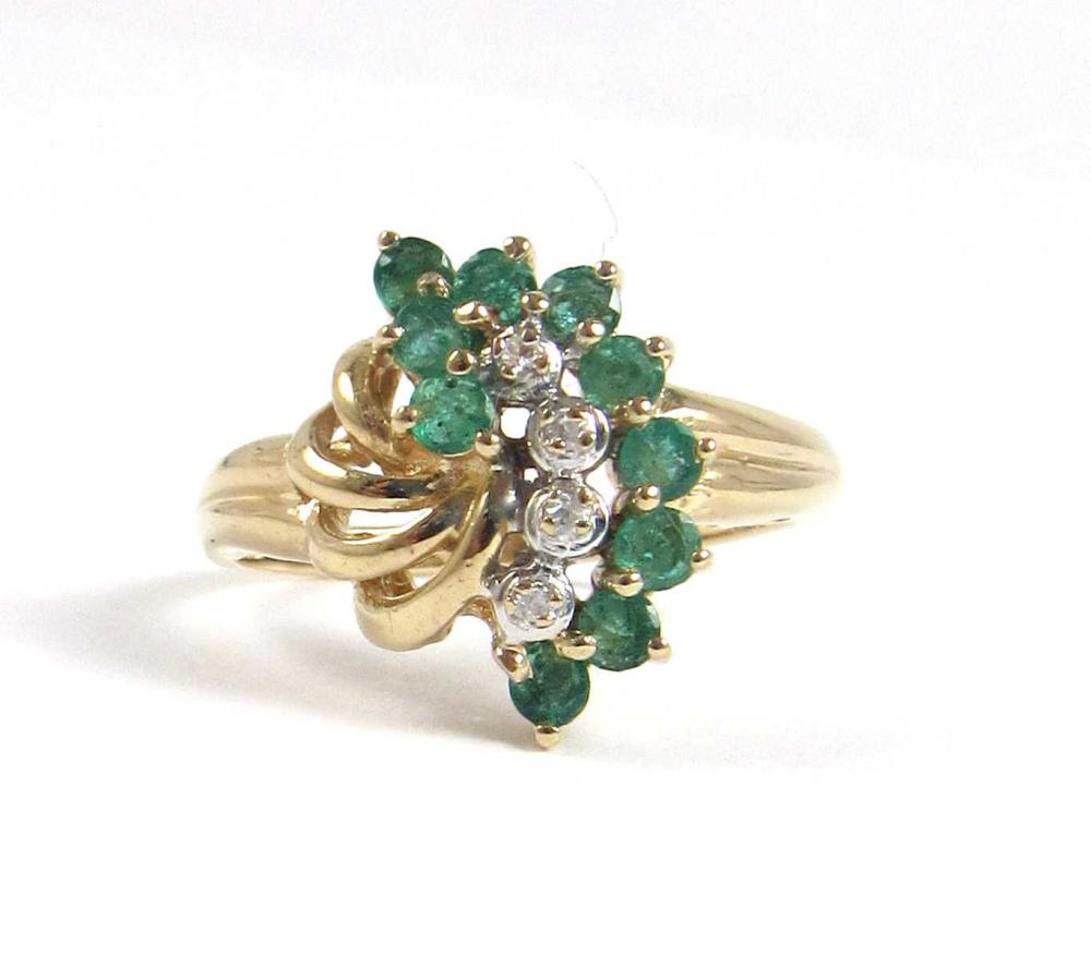 Appraisal: EMERALD AND DIAMOND CLUSTER RING Round-cut green emeralds ct total