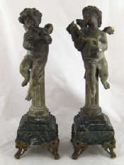 Appraisal: A pair of spelter figures of cherubs playing and singing