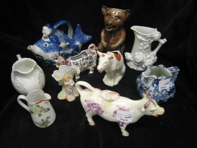 Appraisal: Collection of Porcelain Cream Pitchers mostly figural includes cows bear